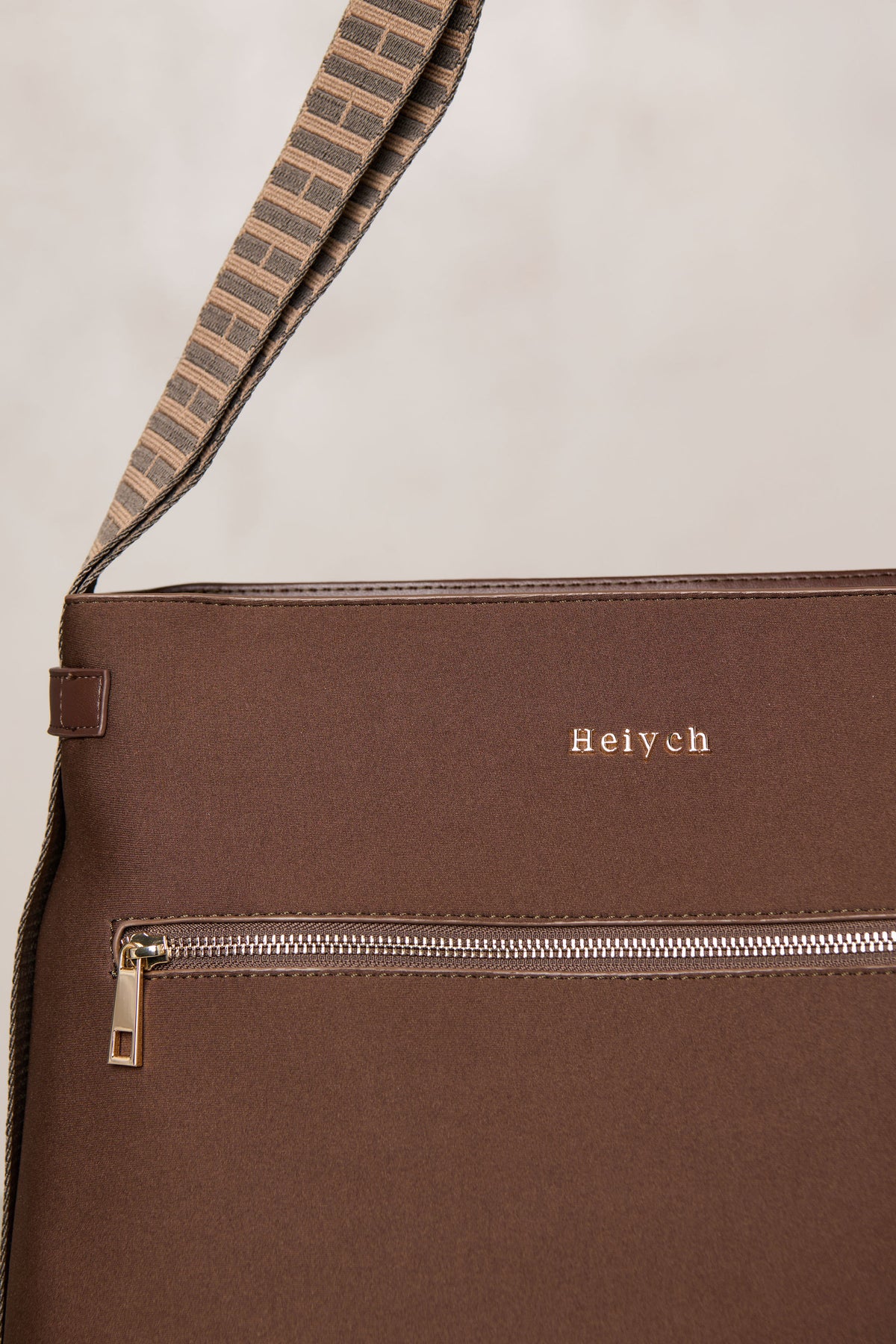 Chocolate brown bag with gold hardware