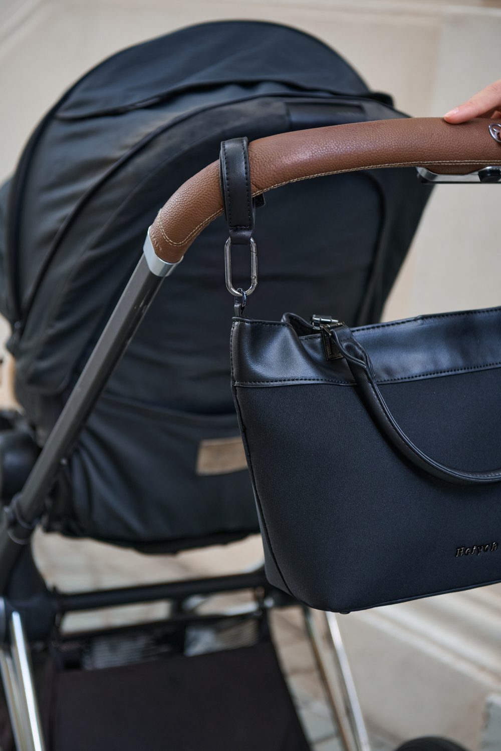 Black Heiych H-Pram Straps for attaching bags to a pram
