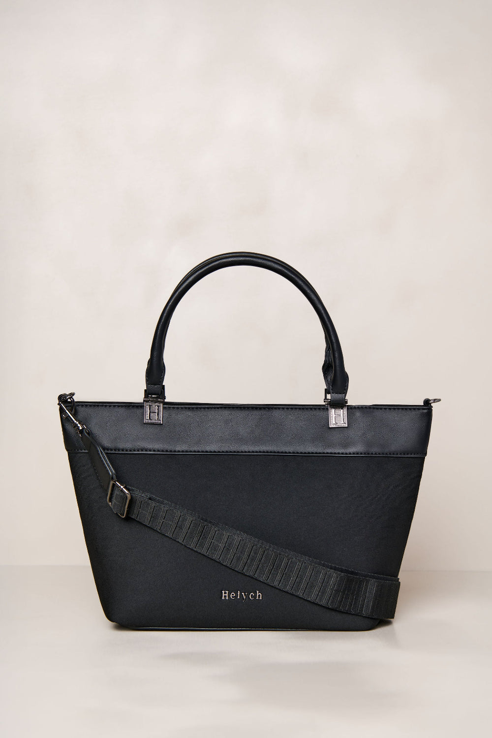 Black neoprene crossbody tote bag with handle and adjustable strap